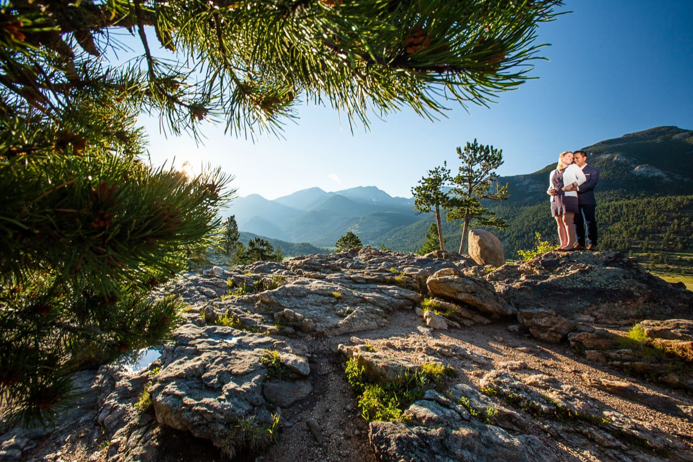 A summer engagement photo at west horseshoe park in rocky mountain national park.