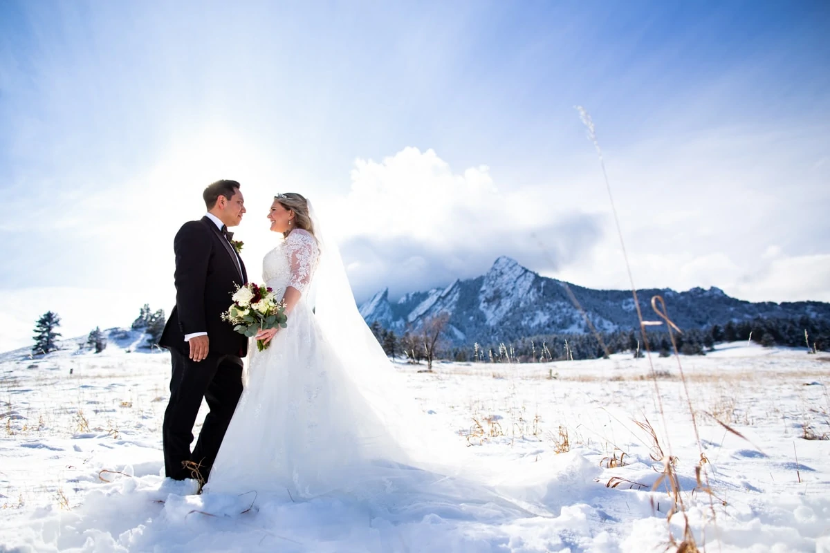A january elopement with snow over the Flatirons in Boulder, Colorado.