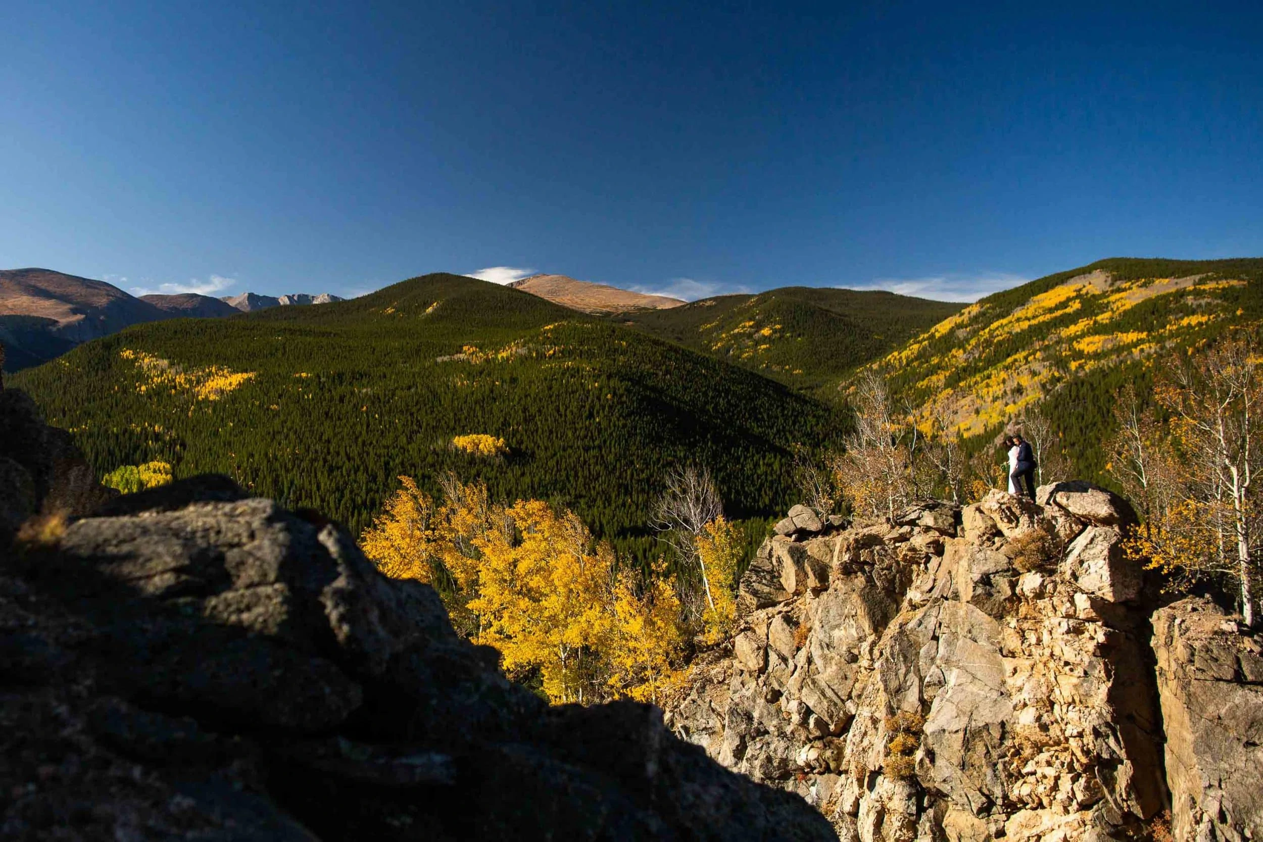 A fall elopement with Mt. Evans in the background.