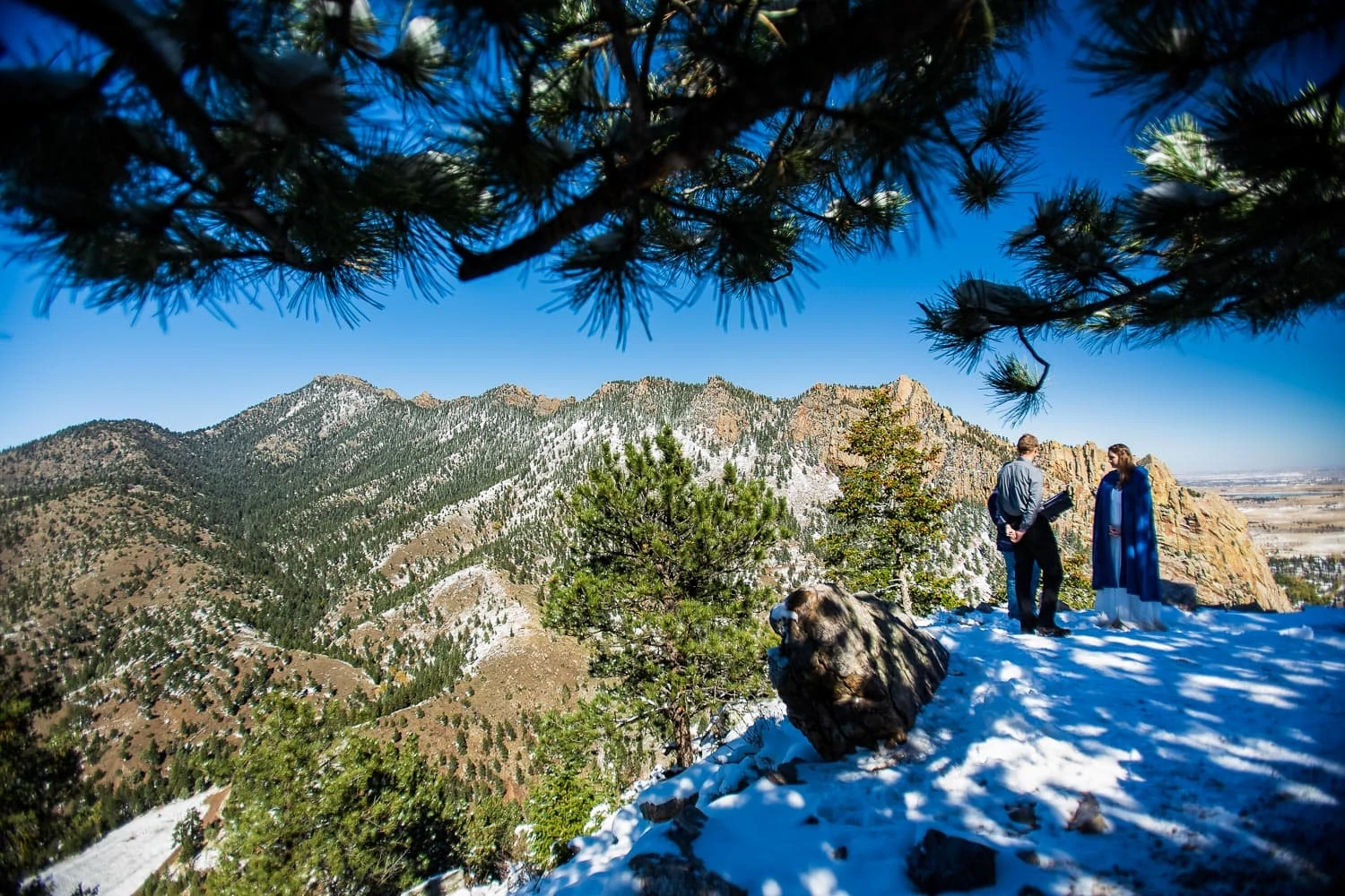 An elopement ceremony at the Continental Divide in Eldorado Canyon, Boulder, CO in winter.