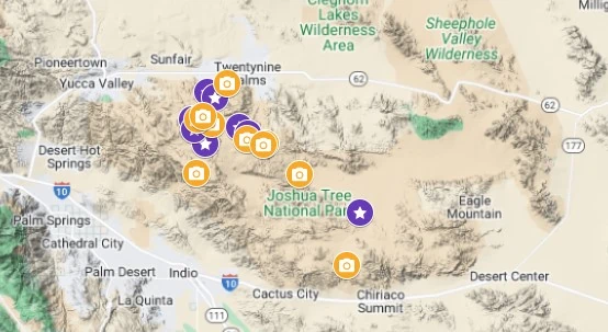 A map of the best photo locations in Joshua Tree National park marked with yellow icons, and the 11 ceremony sites marked with purple stars.