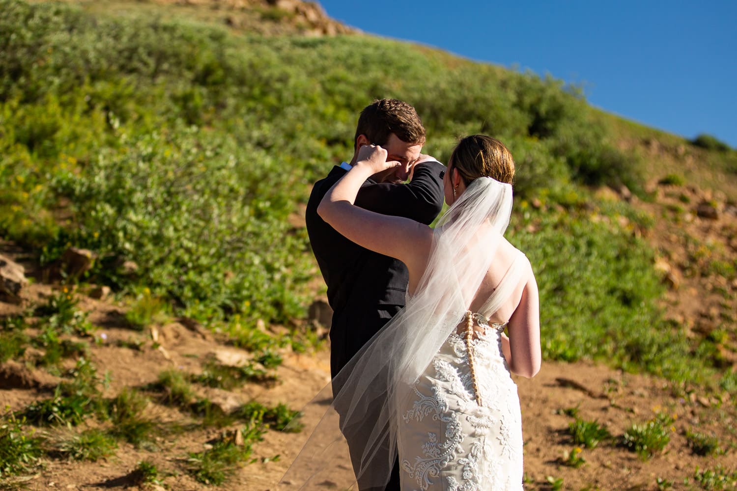An emotional vow reading at a mountain elopement.