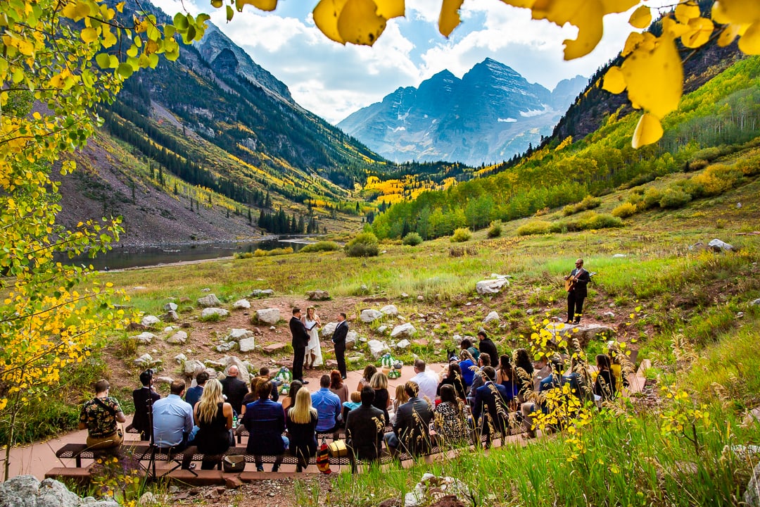 two grooms have their elopement ceremony at the Maroon Bells.
