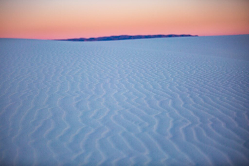 Of all the unique places to elope, white sands stands out with its cool sandy ridges and peachy sunsets.