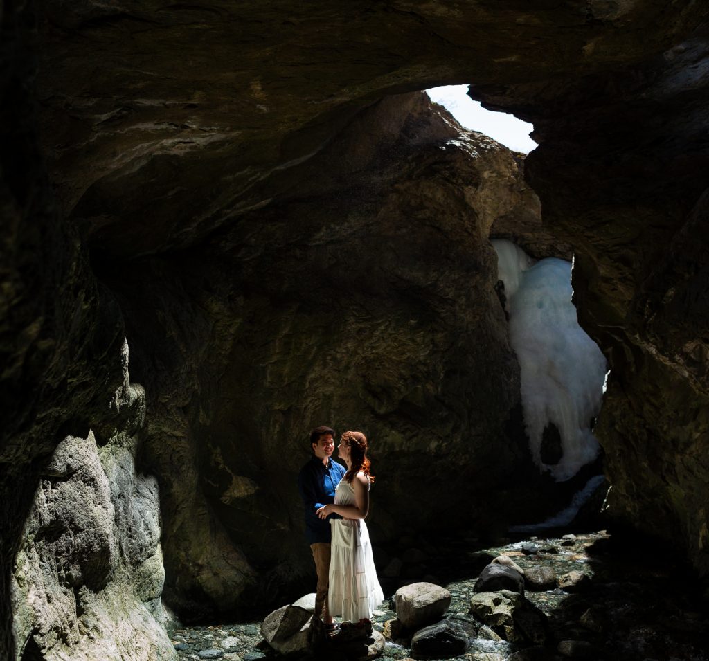 An elopement couple at Zapata falls near Great Sand Dunes national park.