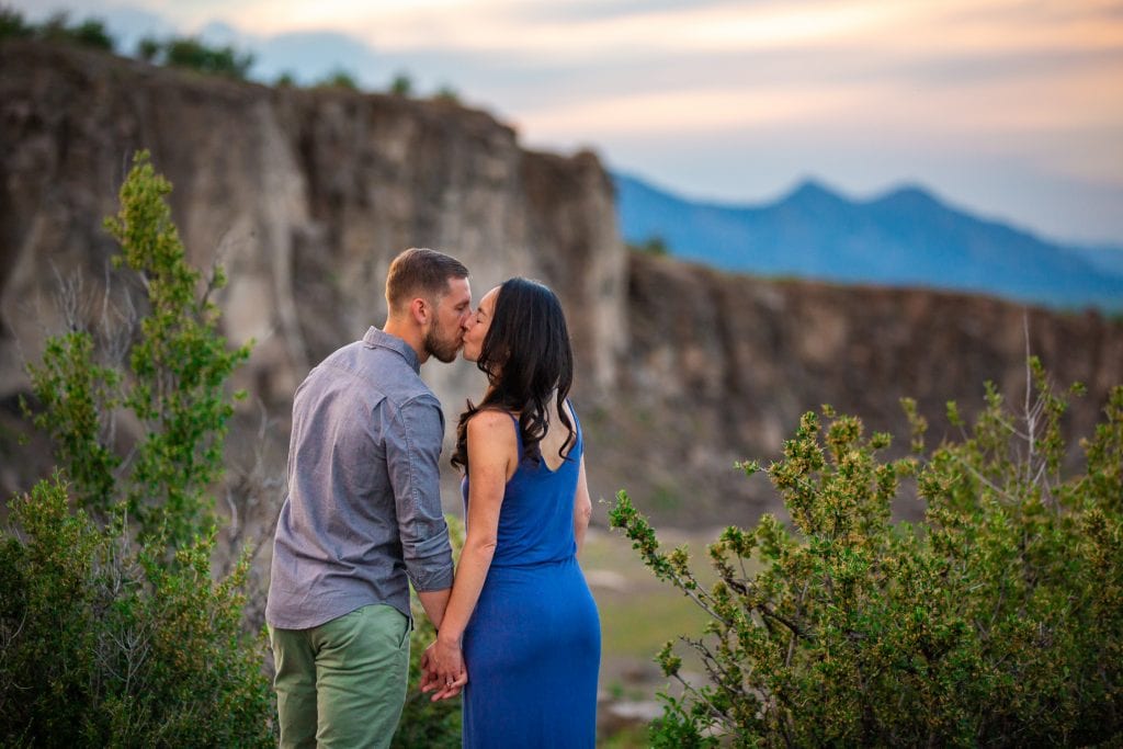 an engagement photo on a cliff in Golden, CO.