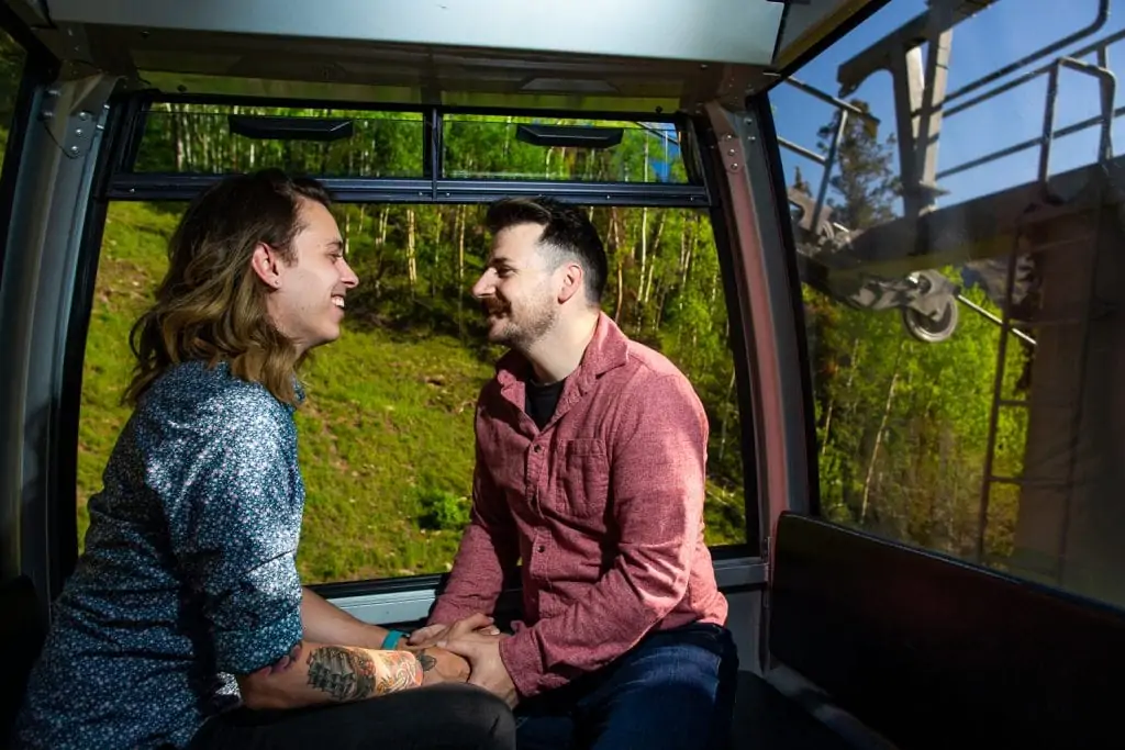 An engagement photo in telluride's free gondola.