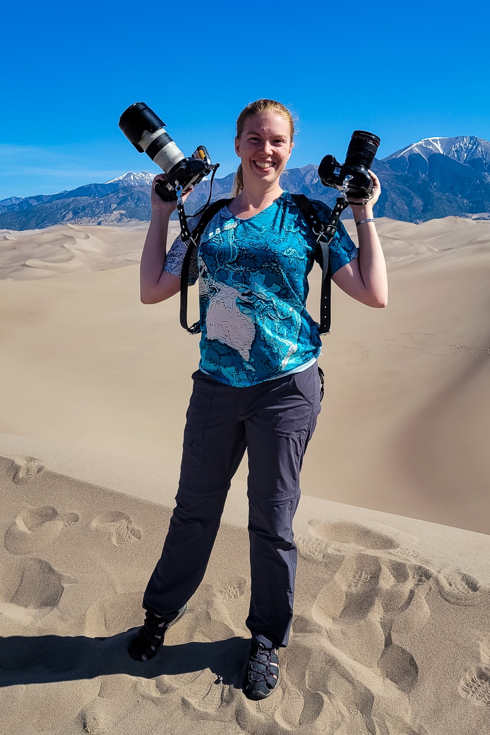 A photographer in great sand dunes national park.