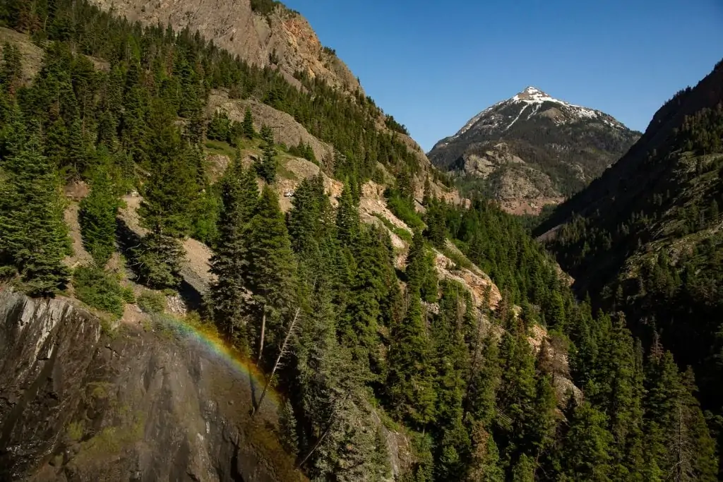 A rainbow over a waterfall in Ouray, Colorado.
