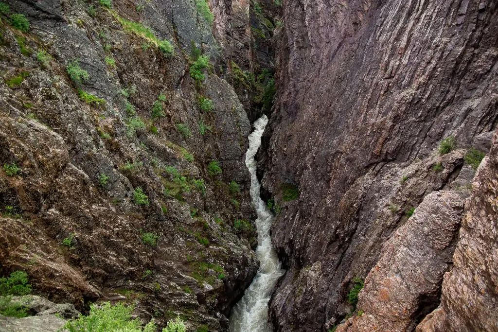 The deep chasm of box canyon park in Ouray, Colorado.