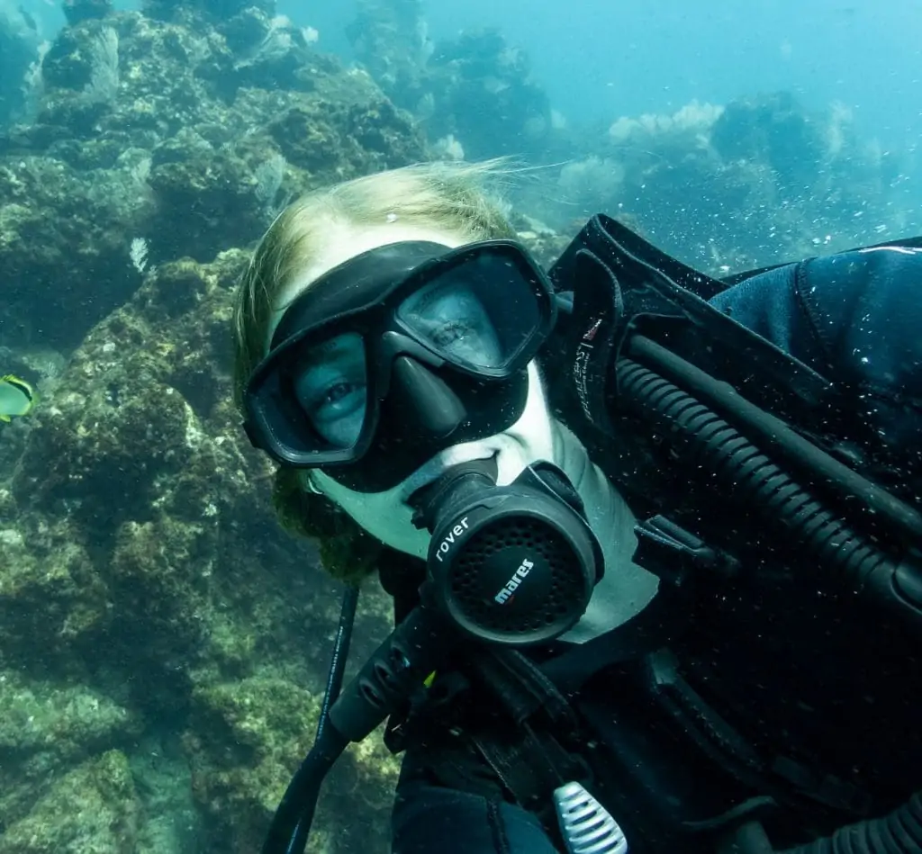 Lucy is PADI scuba certified underwater diving elopement photographer diving in Costa Rica.