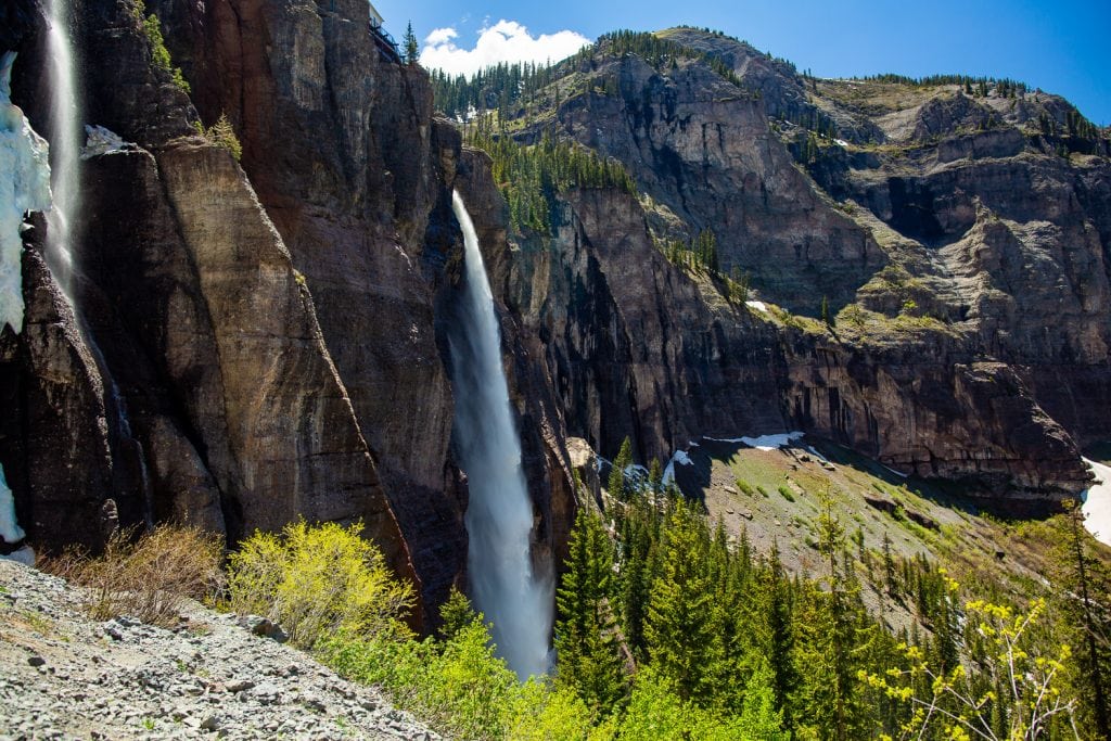A huge waterfall tumbles off a cliff in Colorado.