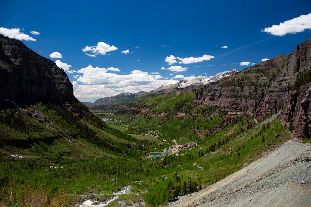 The town of Telluride in the valley in summer.