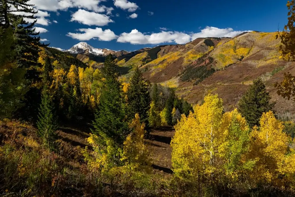 Haystack mountain is visible from Snowmass, Colorado in this early October photograph.