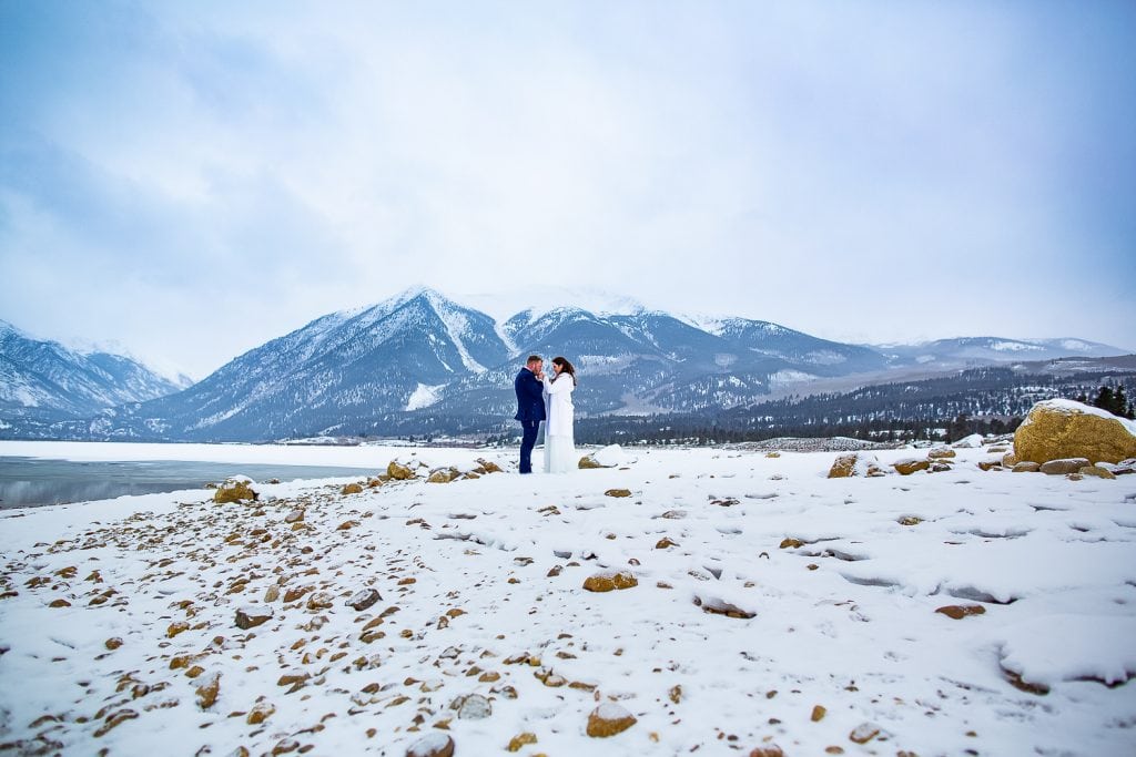 A couple eloping on the shore of Twin Lakes near Aspen in Colorado