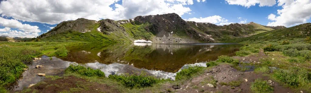 A panorama of a mountain lake in Aspen, Colorado.