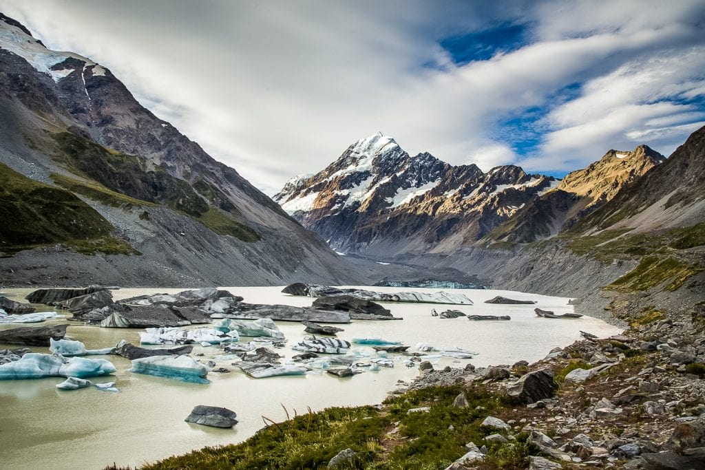 Hooker lake at the foot of Mt. Cook is filled with small icebergs.