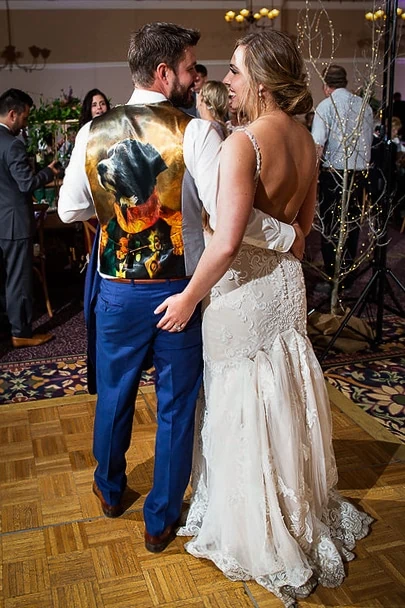 This groom wore a custom vest with a photo of their dog