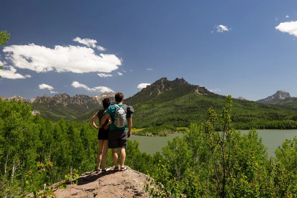 A hiking couple at Silver Jack Reservoir in Colorado.