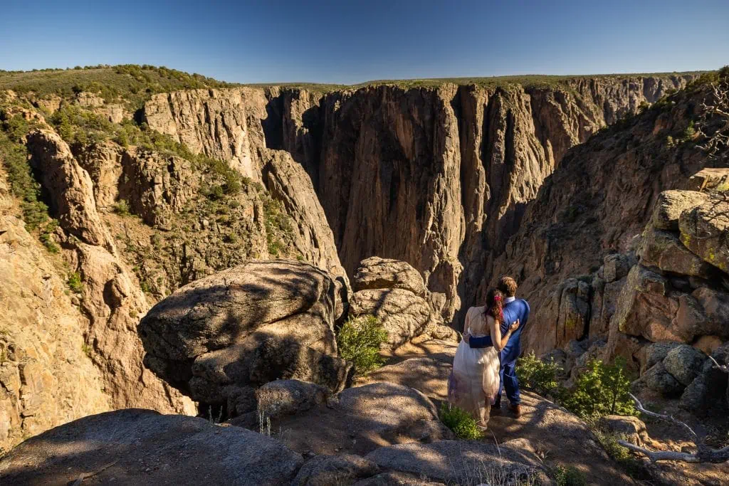 A wedding couple on the north rim of Black Canyon in Colorado.