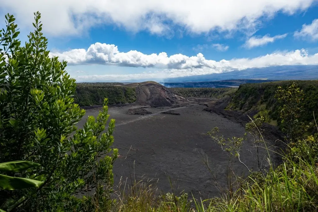 The view looking down on Kilauea iki crater on a sunny day.