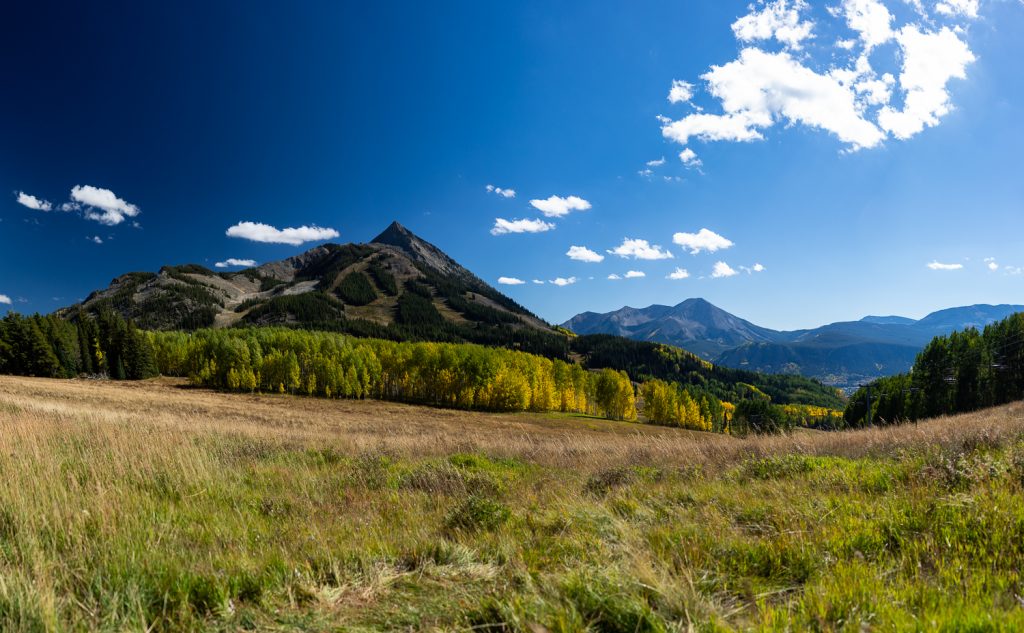 Mt. Crested Butte with yellow and green aspens.