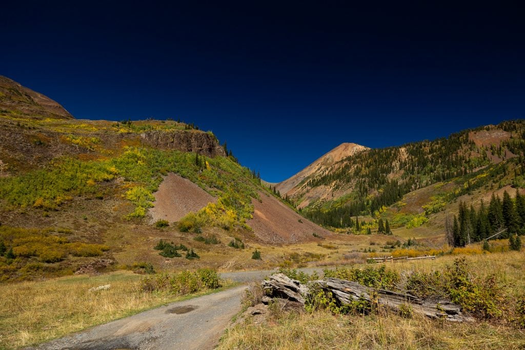 A 4 wheel drive road leads to this valley of mountains in Crested Butte, Colorado.