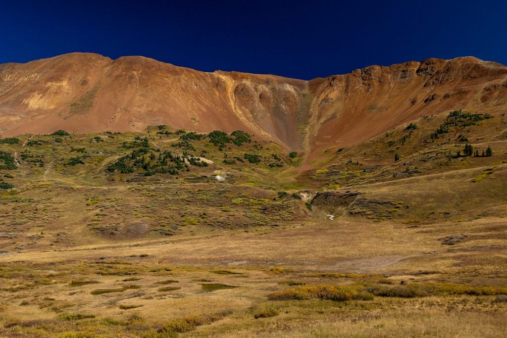 A red mountainside is a colorful place to elope in Crested Butte.