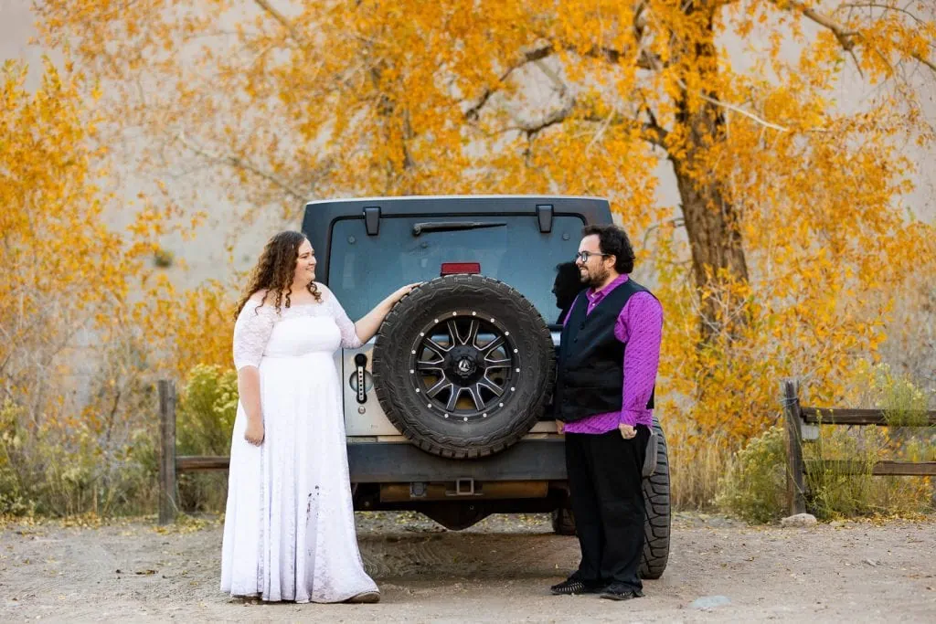 A wedding couple hired a jeep tour at Great Sand Dunes national park for sightseeing. 