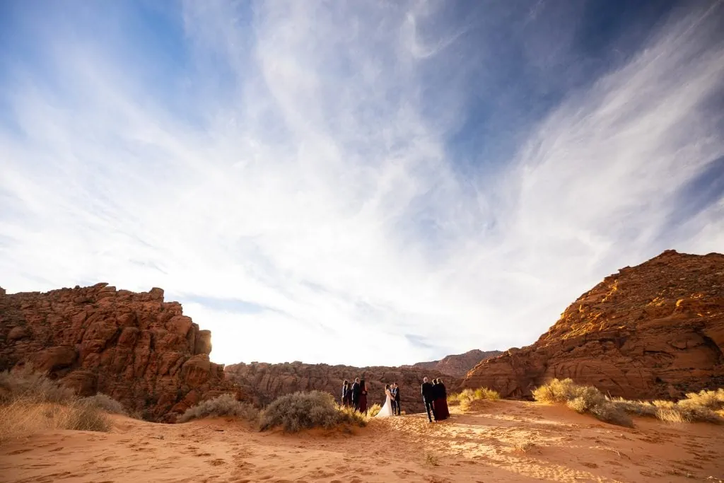 An elopement ceremony at the sand dunes in snow canyon state park.