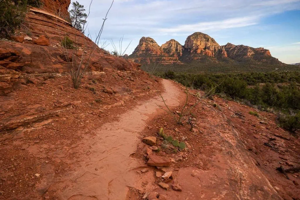 A landscape photo of the red rock sandstone mountains in Sedona, Arizona.