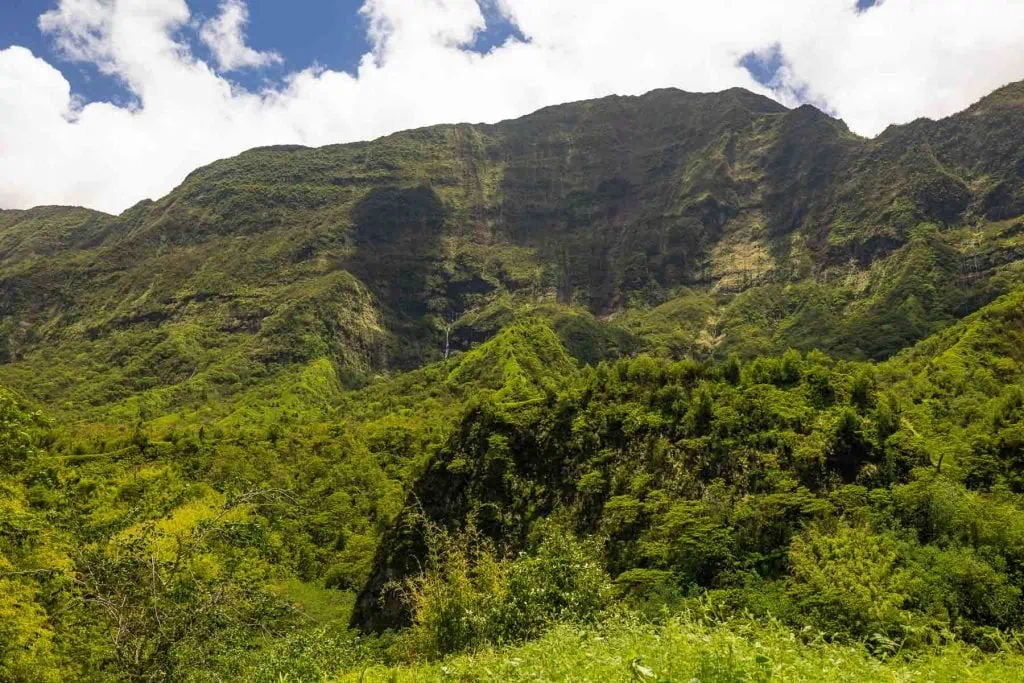 High mountain fins soar above the green jungle interior of Tahiti.
