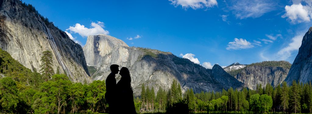 The silhouette of the newlyweds against half dome in their Yosemite National park elopement photos.