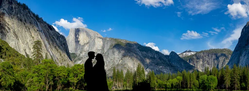 The silhouette of the newlyweds against half dome in their Yosemite National park elopement photos.