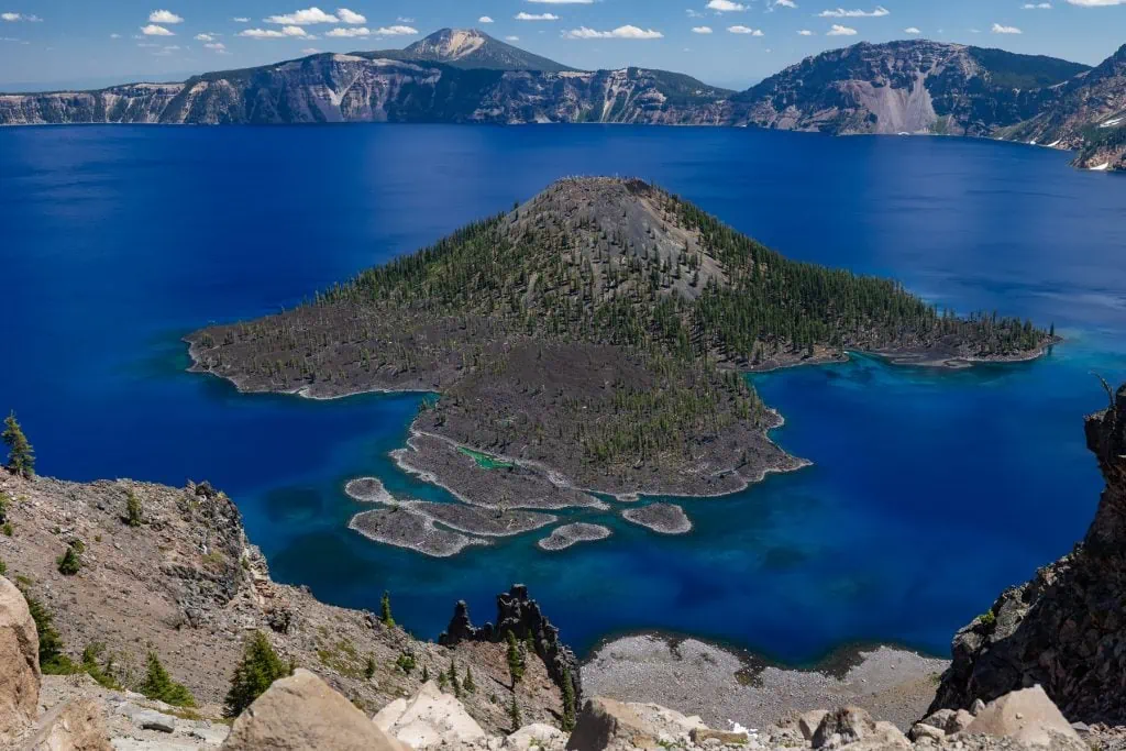A view of the volcanic cone called Wizard Island within Crater Lake National Park.