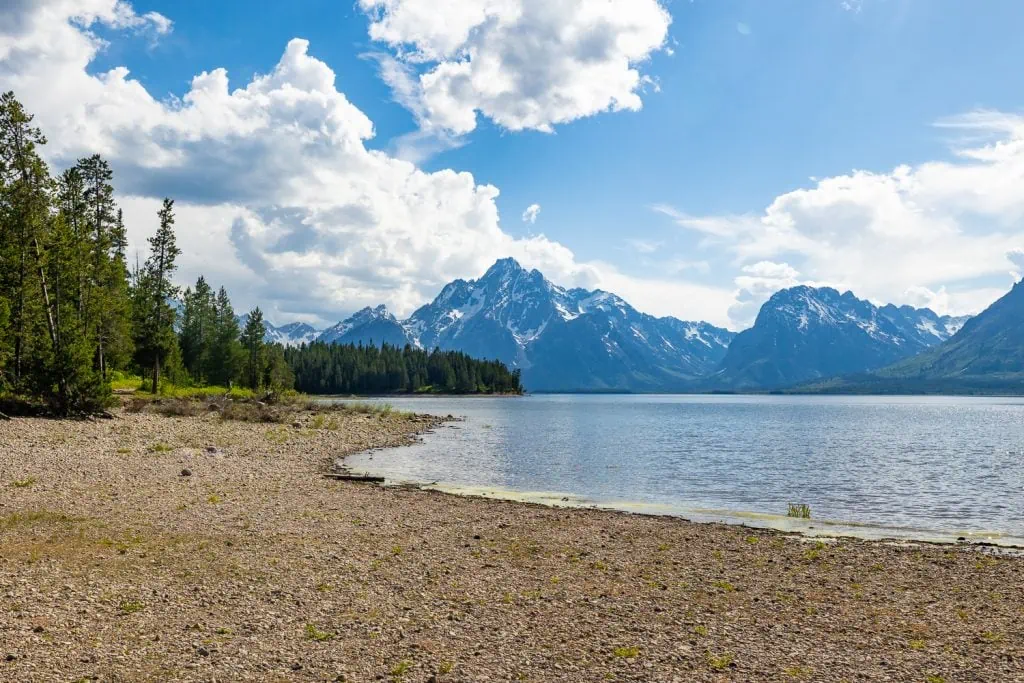 A sunny day at Colter Bay Beach on Jackson Lake in Grand Tetons National Park. The beach is one of the designated ceremony sites in Grand tetons.