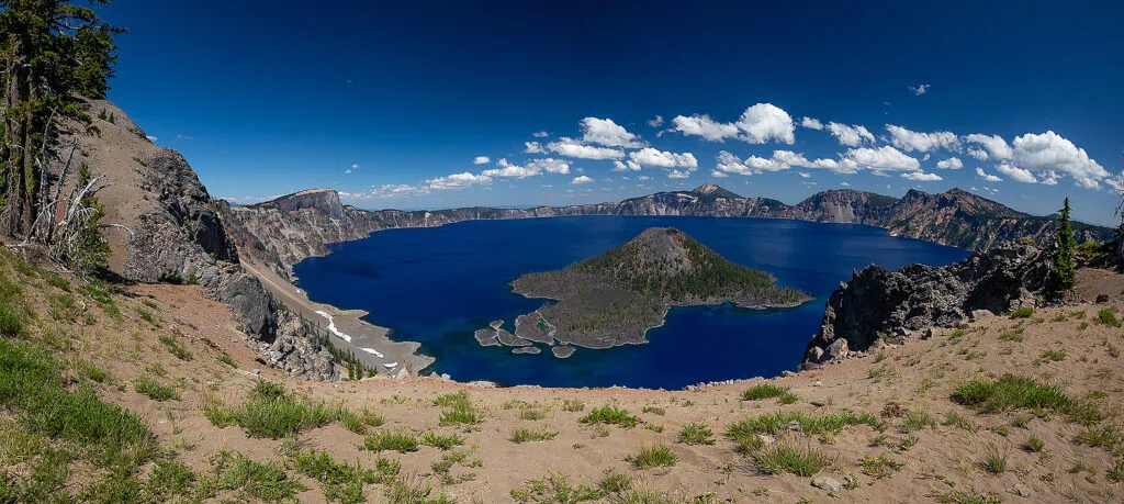 A beautiful panorama of Crater Lake National Park in summer.