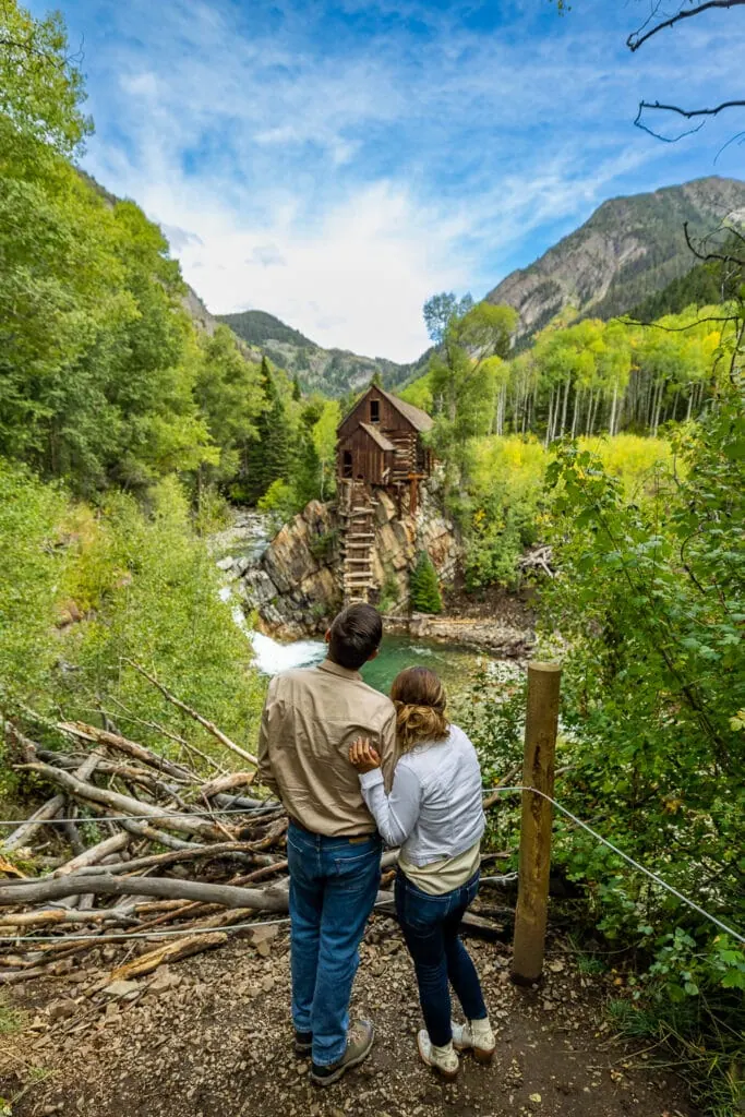 A couple looking at crystal mill in Marble Colorado during early September.