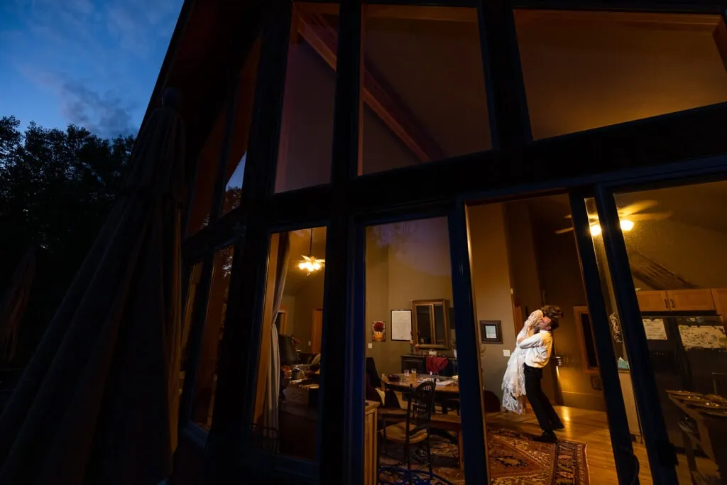An elopement couple's first dance at an airbnb in Marble Colorado.