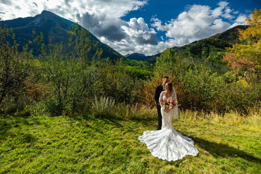 A portrait of an elopement couple on a sunny september day in the mountains of Colorado near Marble.